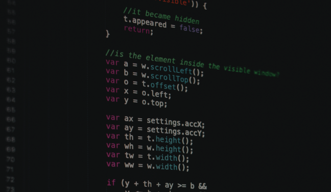 blurred image of coding on a computer screen